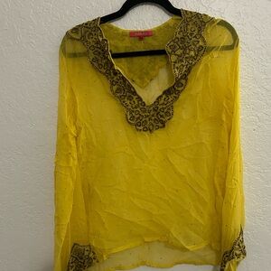 215. Nikka New York Sheer long sleeve blouse.